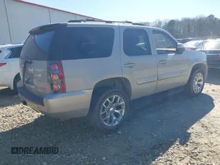 2007 GMC Yukon SLT with VIN 1GKFK130X7J116272, listed as a IAAI auction lot 41637965 with 203,581 mi miles. Bid and sale history available at carsss.com. Image 4.