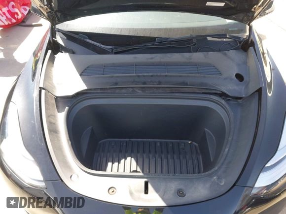 2022 Tesla Model Y Long Range z VIN 7SAYGAEE5NF428327, wystawiony jako IAAI lot #41698750 z przebiegiem 26 846 mil mil oraz . Historia ofert i sprzedaży dostępna na DreamBid. Obrazek 10.