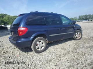 2005 Dodge Caravan SXT with VIN 1D4GP45R75B433581, listed as a Copart auction lot 66086095 with 98,096 mi miles and Salvage title. Bid and sale history available at DreamBid. Image 3.