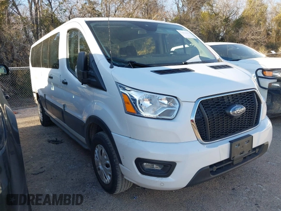 2021 Ford Transit Passenger XL z VIN 1FBAX2Y89MKA49850, wystawiony jako IAAI lot #41602893 z przebiegiem 74 248 mil mil oraz . Historia ofert i sprzedaży dostępna na DreamBid. Obrazek 1.