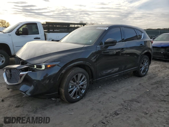 2024 Mazda CX-5 2.5 Turbo Signature with VIN JM3KFBXY7R0515256, listed as a Copart auction lot 87404694 with 4,699 mi miles and Salvage Title. Bid and sale history available at carsss.com. Image 1.