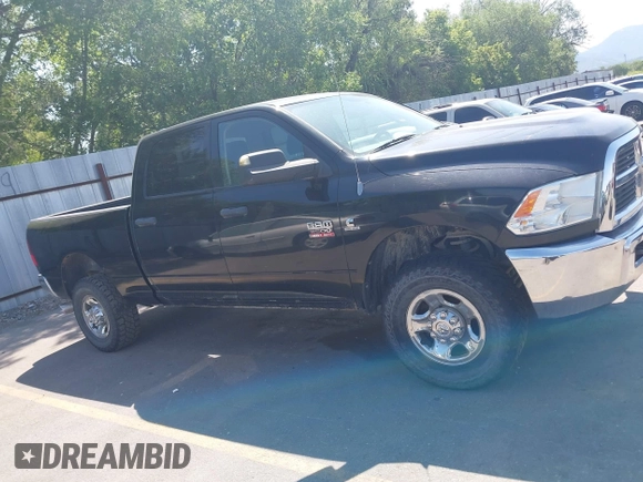 2012 Ram 2500 ST z VIN 3C6UD5CL2CG291018, wystawiony jako IAAI lot #42573010 z przebiegiem Nie podano mil oraz . Historia ofert i sprzedaży dostępna na DreamBid. Obrazek 12.