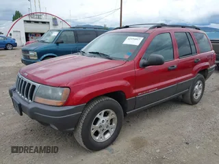 2001 Jeep Grand Cherokee Laredo with VIN 1J4GW48N51C732011, listed as a IAAI auction lot 42194017 with 195,716 mi miles and . Bid and sale history available at DreamBid. Image 2.