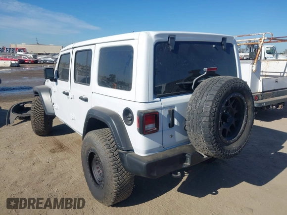 2023 Jeep Wrangler Willys with VIN 1C4HJXDG0PW638871, listed as a IAAI auction lot 42700599 with 16,171 mi miles and . Bid and sale history available at DreamBid. Image 3.