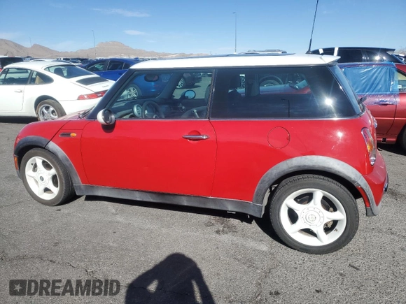 2002 MINI Hardtop with VIN WMWRC33492TC36548, listed as a Copart auction lot 46743455 with 144,260 mi miles and Clean Title. Bid and sale history available at DreamBid. Image 2.
