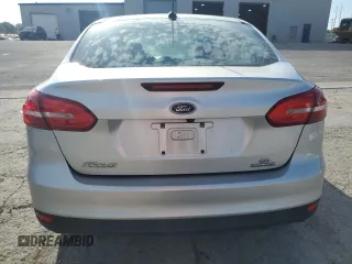 2015 Ford Focus SE with VIN 1FADP3F28FL234097, listed as a Copart auction lot 62660245 with 120,100 mi miles and Salvage title. Bid and sale history available at DreamBid. Image 6.