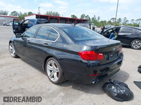 2011 BMW 5 Series 528i with VIN WBAFR1C58BC750449, listed as a IAAI auction lot 42083667 with 212,094 mi miles and . Bid and sale history available at carsss.com. Image 3.