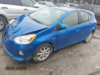 2014 Toyota Prius One z VIN JTDKDTB34E1571983, wystawiony jako IAAI lot #41760657 z przebiegiem 237 497 mil mil oraz . Historia ofert i sprzedaży dostępna na DreamBid. Obrazek 2.