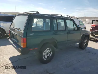 1996 Jeep Cherokee Sport with VIN 1J4FJ68S3TL257912, listed as a Copart auction lot 77109634 with 53,841 mi miles and Clean Title. Bid and sale history available at carsss.com. Image 3.