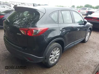 2013 Mazda CX-5 Sport with VIN JM3KE2BE8D0125002, listed as a IAAI auction lot 42425404 with 183,551 mi miles and . Bid and sale history available at DreamBid. Image 4.