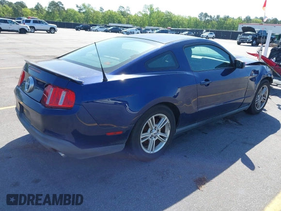 2012 Ford Mustang V6 Premium with VIN 1ZVBP8AM5C5244459, listed as a IAAI auction lot 41920863 with 127,034 mi miles. Bid and sale history available at carsss.com. Image 4.