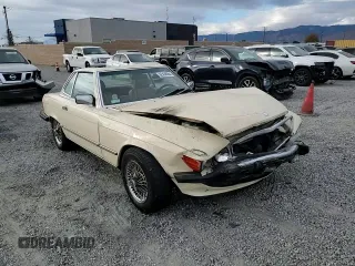 1986 Mercedes-Benz 560 SL z VIN WDBBA48D9GA042092, wystawiony jako Copart lot #82438564 z przebiegiem 43 758 mil mil oraz Szkoda całkowita • Salvage title. Historia ofert i sprzedaży dostępna na DreamBid. Obrazek 11.