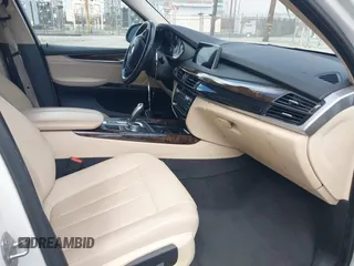 2016 BMW X5 sDrive35i with VIN 5UXKR2C55G0H43136, listed as a IAAI auction lot 41835931 with 125,751 mi miles. Bid and sale history available at carsss.com. Image 5.
