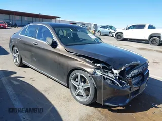 2016 Mercedes-Benz C 300 z VIN 55SWF4JB1GU155389, wystawiony jako IAAI lot #40807187 z przebiegiem 134 262 mil mil oraz . Historia ofert i sprzedaży dostępna na DreamBid. Obrazek 1.