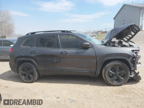 2021 Jeep Cherokee Altitude with VIN 1C4PJLLB8MD115101, listed as a IAAI auction lot 39082879 with 58,266 mi miles. Bid and sale history available at carsss.com. Image 12.