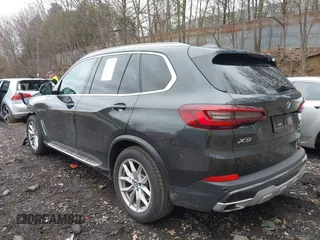 2023 BMW X5 xDrive40i with VIN 5UXCR6C07P9N61205, listed as a IAAI auction lot 42010313 with 34,127 mi miles. Bid and sale history available at carsss.com. Image 3.