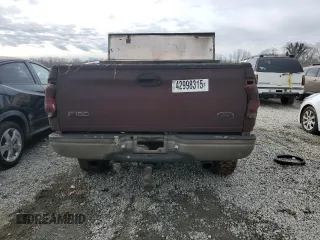 1999 Ford F-150 z VIN 1FTRF18W2XNA60279, wystawiony jako Copart lot #42998315 z przebiegiem Nie podano mil oraz Szkoda całkowita • Salvage title. Historia ofert i sprzedaży dostępna na DreamBid. Obrazek 6.