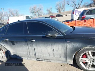 2017 Audi A6 Premium z VIN WAUF8AFC5HN061978, wystawiony jako IAAI lot #41424637 z przebiegiem 168 434 mil mil oraz . Historia ofert i sprzedaży dostępna na DreamBid. Obrazek 13.