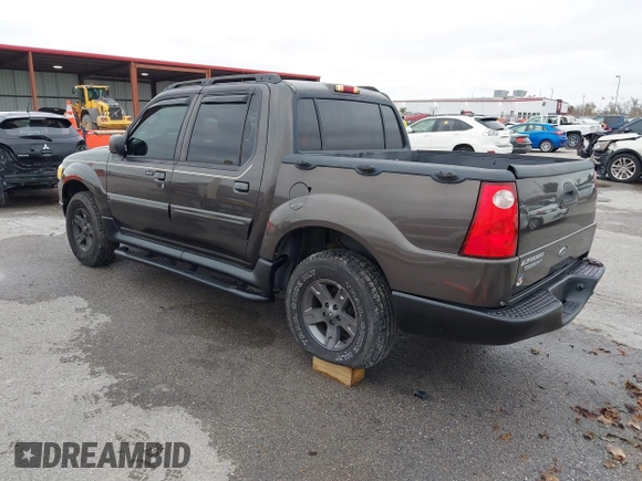 2005 Ford Explorer Sport Trac XLS z VIN 1FMZU77K05UB13891, wystawiony jako IAAI lot #40859877 z przebiegiem 157 308 mil mil oraz . Historia ofert i sprzedaży dostępna na DreamBid. Obrazek 3.