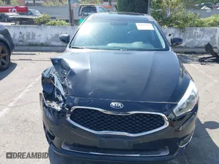 2015 Kia Cadenza Premium with VIN KNALN4D71F5173211, listed as a IAAI auction lot 42039170 with 128,625 mi miles. Bid and sale history available at carsss.com. Image 12.