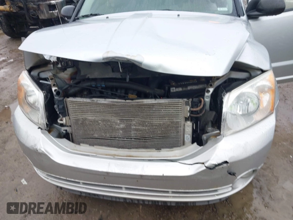 2011 Dodge Caliber Mainstreet with VIN 1B3CB3HA3BD234264, listed as a IAAI auction lot 41998567 with 132,687 mi miles and . Bid and sale history available at DreamBid. Image 6.