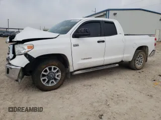 2016 Toyota Tundra 4WD Truck SR with VIN 5TFUW5F19GX561943, listed as a Copart auction lot 55828443 with 124,236 mi miles. Bid and sale history available at carsss.com. Image 1.