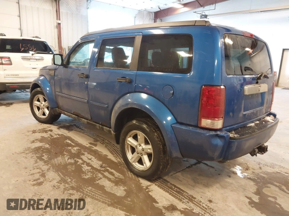 2007 Dodge Nitro SLT with VIN 1D8GU58KX7W614584, listed as a IAAI auction lot 41036412 with 177,523 mi miles. Bid and sale history available at carsss.com. Image 3.