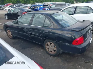 2006 Nissan Sentra S z VIN 3N1CB51D36L470317, wystawiony jako IAAI lot #42112934 z przebiegiem 303 501 mil mil oraz . Historia ofert i sprzedaży dostępna na DreamBid. Obrazek 14.