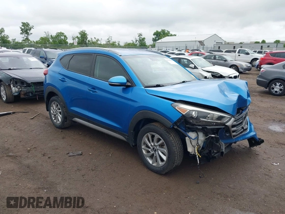 2017 Hyundai Tucson Sport z VIN KM8J33A23HU319048, wystawiony jako IAAI lot #42340603 z przebiegiem 51 738 mil mil oraz . Historia ofert i sprzedaży dostępna na DreamBid. Obrazek 1.