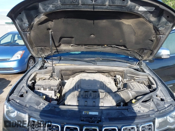 2018 Jeep Grand Cherokee Limited with VIN 1C4RJFBT7JC408526, listed as a IAAI auction lot 42103419 with 103,873 mi miles and . Bid and sale history available at DreamBid. Image 10.