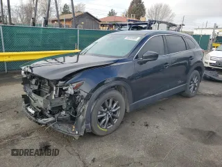 2023 Mazda CX-9 Touring z VIN JM3TCBCY4P0653899, wystawiony jako Copart lot #50999985 z przebiegiem 32 896 mil mil oraz Szkoda całkowita • Salvage title. Historia ofert i sprzedaży dostępna na DreamBid. Obrazek 1.