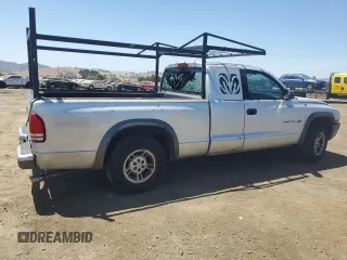 2002 Dodge Dakota with VIN 1B7GL12X32S557546, listed as a Copart auction lot 66879734 with 218,981 mi miles and Salvage Title. Bid and sale history available at carsss.com. Image 3.