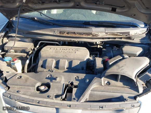 2013 Honda Odyssey Touring with VIN 5FNRL5H9XDB009973, listed as a IAAI auction lot 41904710 with 219,067 mi miles. Bid and sale history available at carsss.com. Image 10.