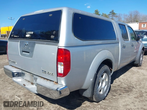 2007 Nissan Frontier SE with VIN 1N6AD09W97C423696, listed as a IAAI auction lot 42010577 with 117,096 mi miles. Bid and sale history available at carsss.com. Image 4.