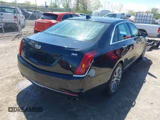 2017 Cadillac CT6 Luxury AWD z VIN 1G6KD5RS5HU133097, wystawiony jako IAAI lot #42144553 z przebiegiem 167 460 mil mil oraz . Historia ofert i sprzedaży dostępna na DreamBid. Obrazek 4.
