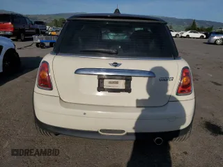 2010 MINI Hardtop with VIN WMWMF3C52ATZ65593, listed as a Copart auction lot 50107445 with 105,389 mi miles and Salvage title. Bid and sale history available at DreamBid. Image 6.