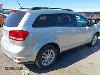 2014 Dodge Journey SXT with VIN 3C4PDCBG8ET118998, listed as a IAAI auction lot 42177885 with 165,247 mi miles. Bid and sale history available at carsss.com. Image 4.