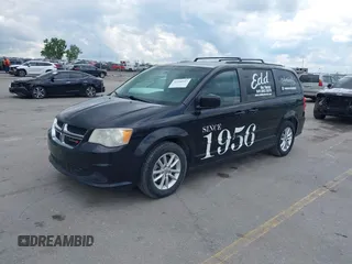 2014 Dodge Grand Caravan SXT z VIN 2C4RDGCGXER388459, wystawiony jako IAAI lot #42350937 z przebiegiem 149 276 mil mil oraz . Historia ofert i sprzedaży dostępna na DreamBid. Obrazek 2.