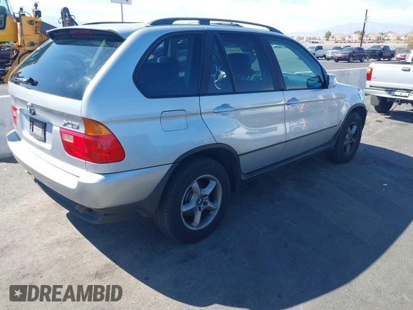 2002 BMW X5 3.0i with VIN 5UXFA53552LV70703, listed as a IAAI auction lot 41957874 with 144,369 mi miles. Bid and sale history available at carsss.com. Image 4.