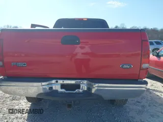 2003 Ford F-150 XL with VIN 1FTRX18W03NA04817, listed as a IAAI auction lot 41599127 with 170,682 mi miles. Bid and sale history available at carsss.com. Image 6.
