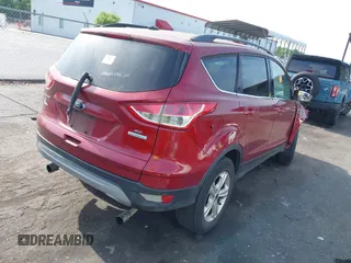 2013 Ford Escape SE with VIN 1FMCU0G98DUD09182, listed as a IAAI auction lot 42103807 with 204,293 mi miles and . Bid and sale history available at DreamBid. Image 4.