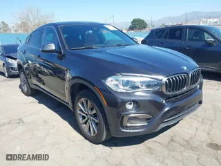 2017 BMW X6 sDrive35i with VIN 5UXKU0C34H0G69291, listed as a IAAI auction lot 41670871 with 73,977 mi miles. Bid and sale history available at carsss.com. Image 1.