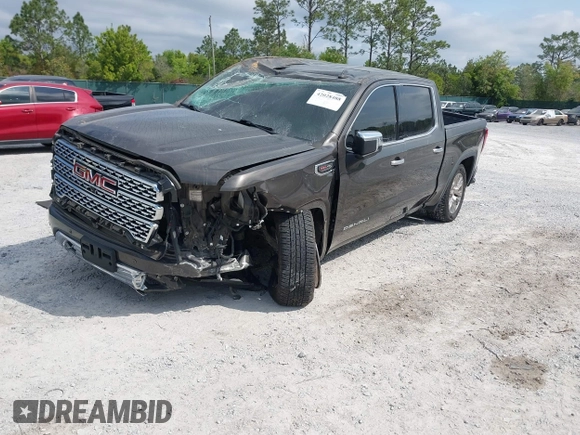 2019 GMC Sierra 1500 Denali z VIN 1GTU9FEL8KZ180128, wystawiony jako IAAI lot #42028488 z przebiegiem 78 015 mil mil oraz . Historia ofert i sprzedaży dostępna na DreamBid. Obrazek 2.