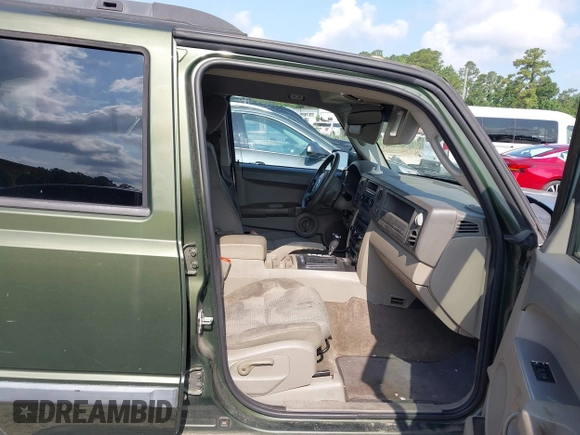 2007 Jeep Commander Sport with VIN 1J8HH48P57C699969, listed as a IAAI auction lot 42387743 with 199,043 mi miles and . Bid and sale history available at DreamBid. Image 5.