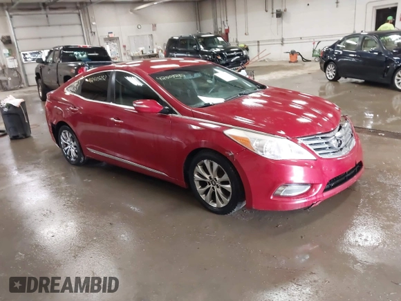 2012 Hyundai Azera z VIN KMHFG4JG7CA183643, wystawiony jako IAAI lot #42503232 z przebiegiem 180 485 mil mil oraz . Historia ofert i sprzedaży dostępna na DreamBid. Obrazek 1.
