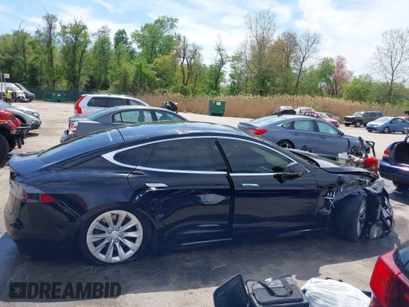 2017 Tesla Model S 60 z VIN 5YJSA1E13HF228486, wystawiony jako IAAI lot #42092686 z przebiegiem 78 089 mil mil oraz . Historia ofert i sprzedaży dostępna na DreamBid. Obrazek 13.