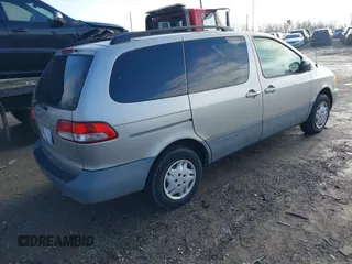 2003 Toyota Sienna CE with VIN 4T3ZF19C33U553315, listed as a IAAI auction lot 41212999 with 274,331 mi miles. Bid and sale history available at carsss.com. Image 4.