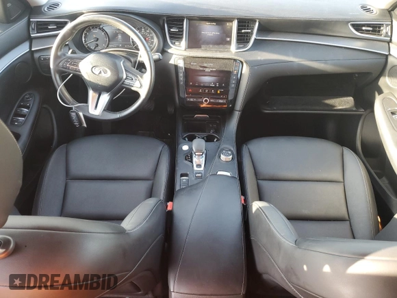 2022 Infiniti QX50 Pure with VIN 3PCAJ5AB2NF117098, listed as a Copart auction lot 83414574 with 30,779 mi miles and Salvage title. Bid and sale history available at DreamBid. Image 8.