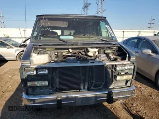 1995 GMC Vandura z VIN 1GDEG25K2SF543904, wystawiony jako Copart lot #68934904 z przebiegiem 949 271 mil mil oraz Szkody całkowita. Historia ofert i sprzedaży dostępna na DreamBid. Obrazek 5.