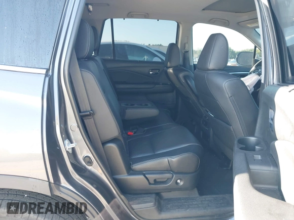 2022 Honda Pilot Special Edition with VIN 5FNYF5H25NB031399, listed as a IAAI auction lot 41638517 with 34,239 mi miles and . Bid and sale history available at carsss.com. Image 8.